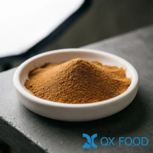 Cinnamon powder CP-K38 -- warm brown fine powder in white ceramic sample dish