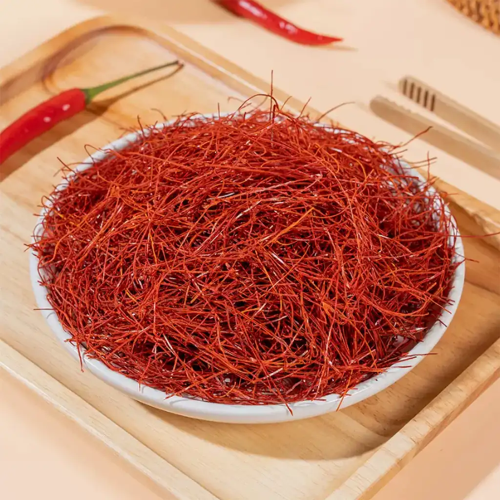 Fine Chili Strips SCT-C18 -- Thin Cut Strips for Korean Banchan, Japanese Ramen and East Asian Cuisine 1 Fine chili strips SCT-C18 -- thin bright red dried chili strips in white ceramic sample dish